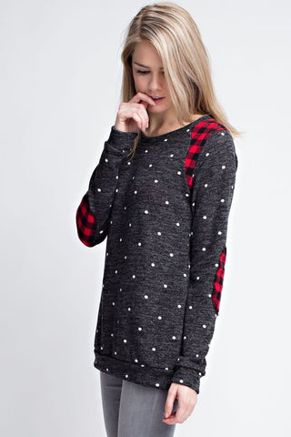 A polka dot knit long sleeves top with plaid shoulder detail and elbow patch