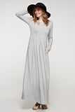 solid maxi dress with long sleeves, elasticized waist and pockets