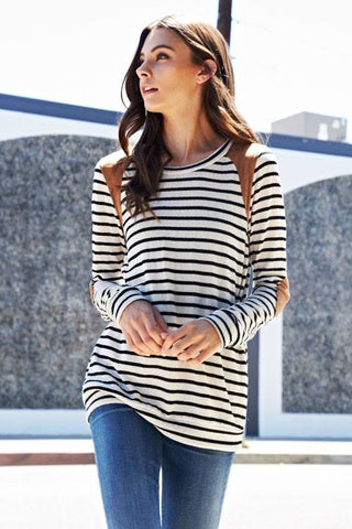 A striped long sleeve knit top with suede shoulder point and elbow patches